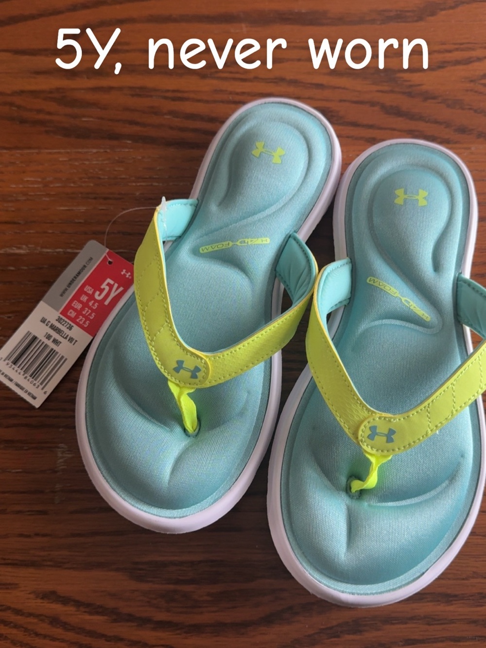 Under Armour Kids Flip Flops in Aqua and Neon Yellow